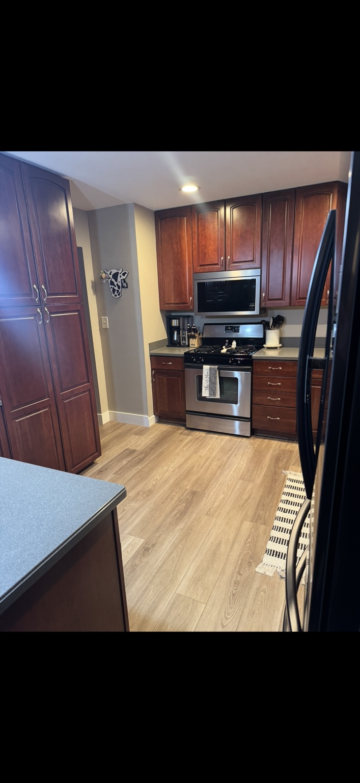 Kitchen with new luxury vinyl plank flooring